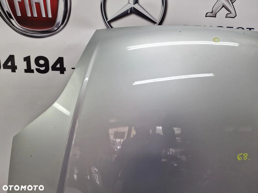 FORD FIESTA MK6 / MK6 LIFT 02-08 ŁADNA MASKA SREBRNA , NR AUKCJI NM68 - 4