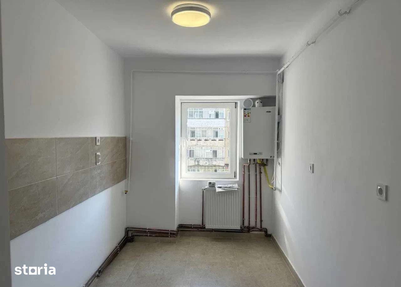 Apartament 2 camere, decomandat, etaj intermediar, statia Bicaz — fotografia 1