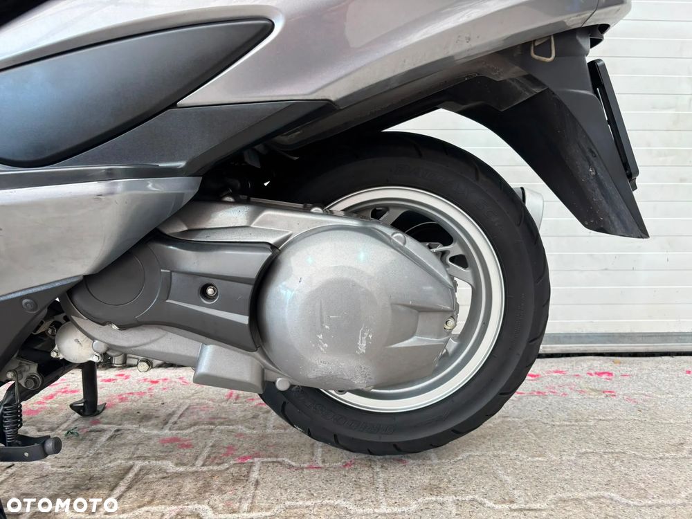 Suzuki Burgman - 23