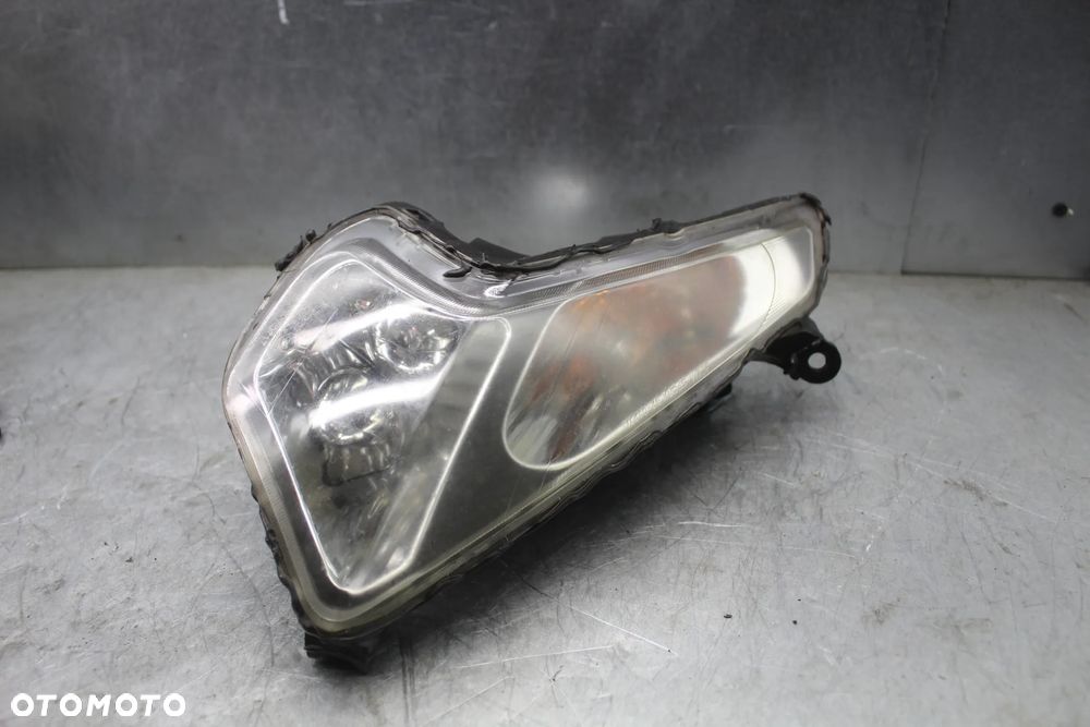 Sym GTS 125 Evo FI 09r Kierunkowskaz prawy przód przedni kierunek