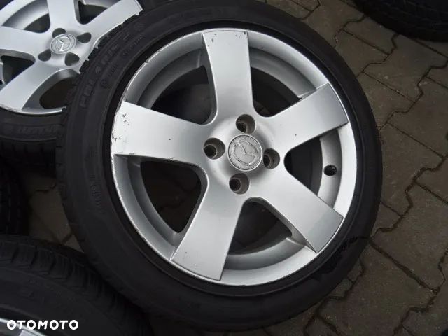 4x100x54b 7Jx15 ET38 Kołą zimowe MAZDA Opony 195/50/R15 - 4