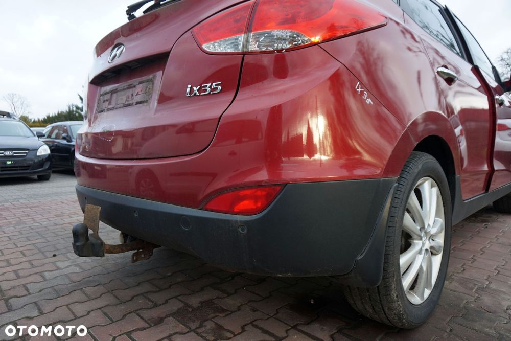 ZDERZAK TYLNY IX35 I  AA1 A0  CZERWONY (INFRA RED) HYUNDAI 2009-2015 - 2