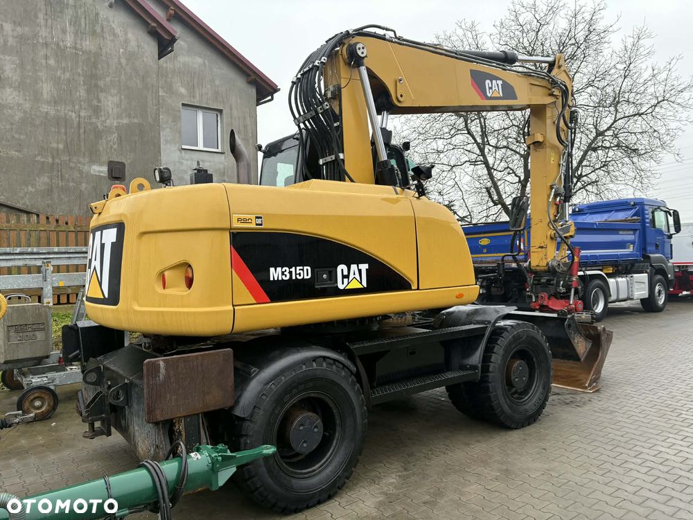 Caterpillar M 315D ROTOTILT SZCZYPCE PODPORY - 3