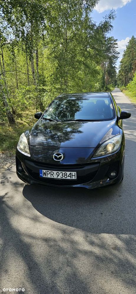 Mazda 3 2.0 MZR DISI Sports-Line - 2