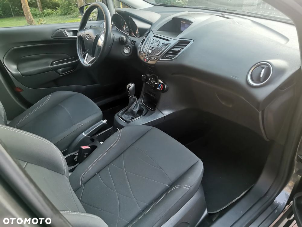 Ford Fiesta 1.4 Ghia - 11