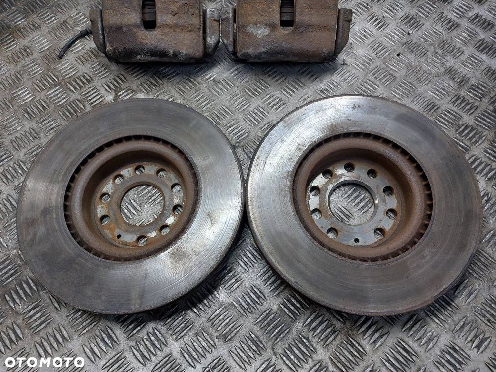 TARCZE HAMULCOWE PRZÓD + KLOCKI + ZACISKI VOLKSWAGEN PASSAT B6 2.0 TDI - 2