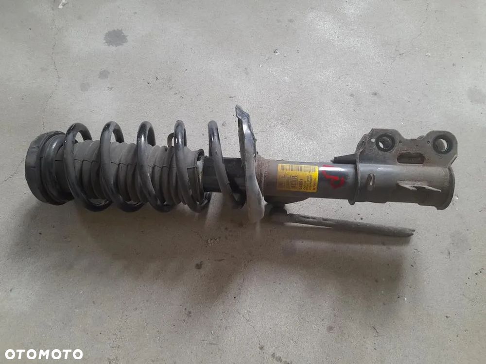 Amortyzator lewy przód przedni Opel Mokka A 1.6b - 1