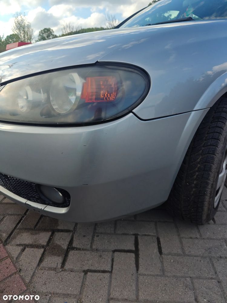 Nissan Almera 1.5 Visia + - 13
