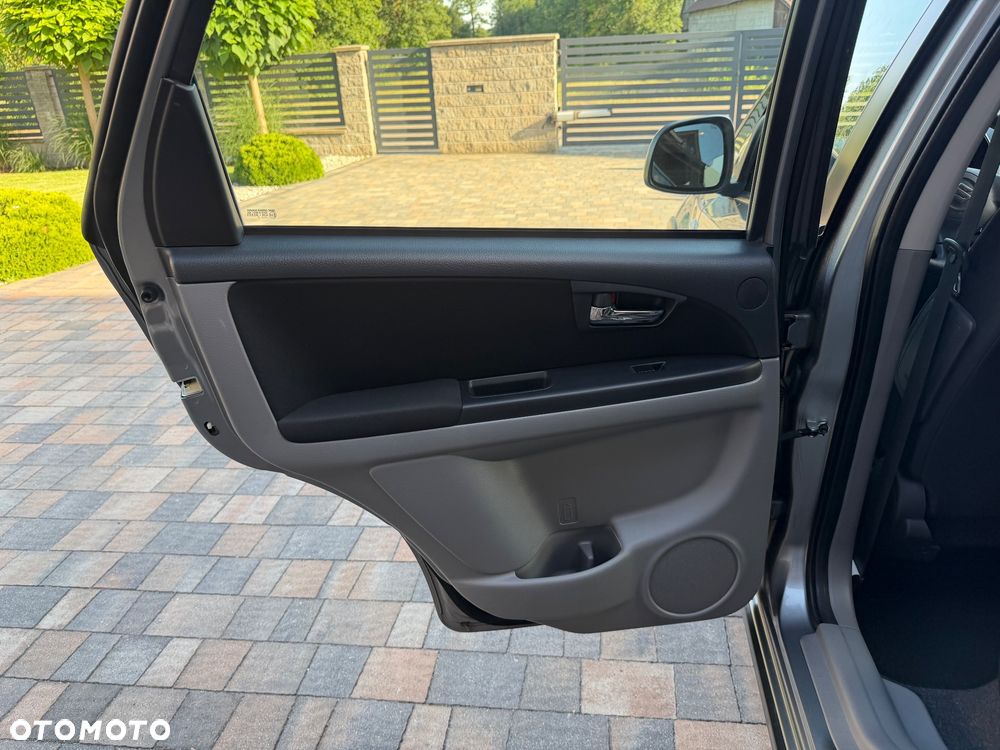 Suzuki SX4 1.6 Comfort Plus - 11