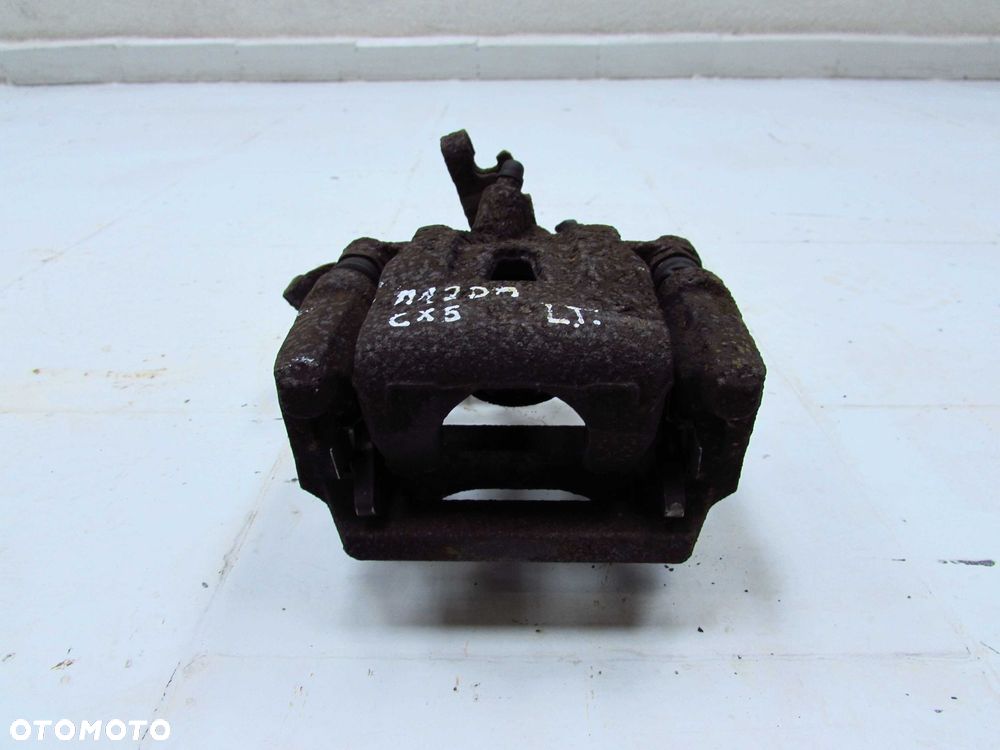 MAZDA CX-5 12-17 ZACISK HAMULCOWY TYL LEWY 4X4 - 2