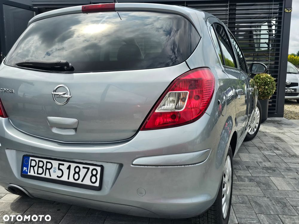 Opel Corsa 1.2 16V Enjoy - 23