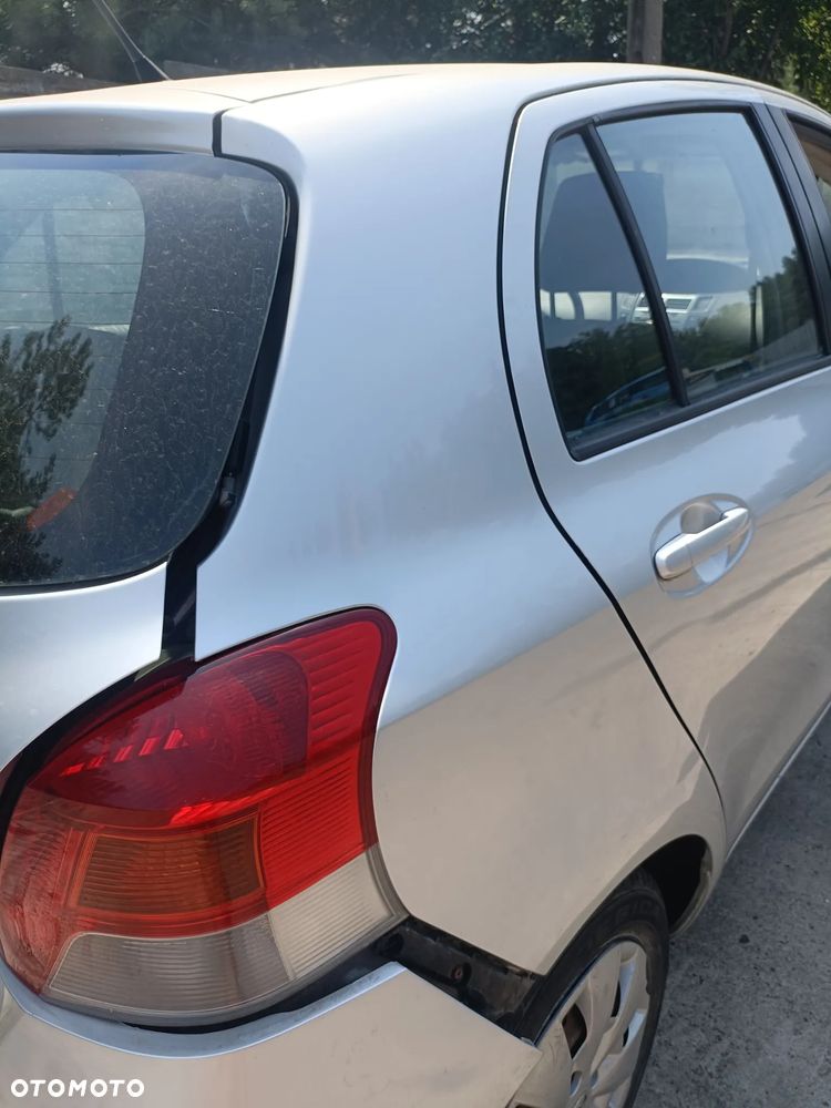 TOYOTA YARIS II 05-11 LIFT 2009 r. 1E7 5D HB błotnik ćwiartka prawy tył PT - 7