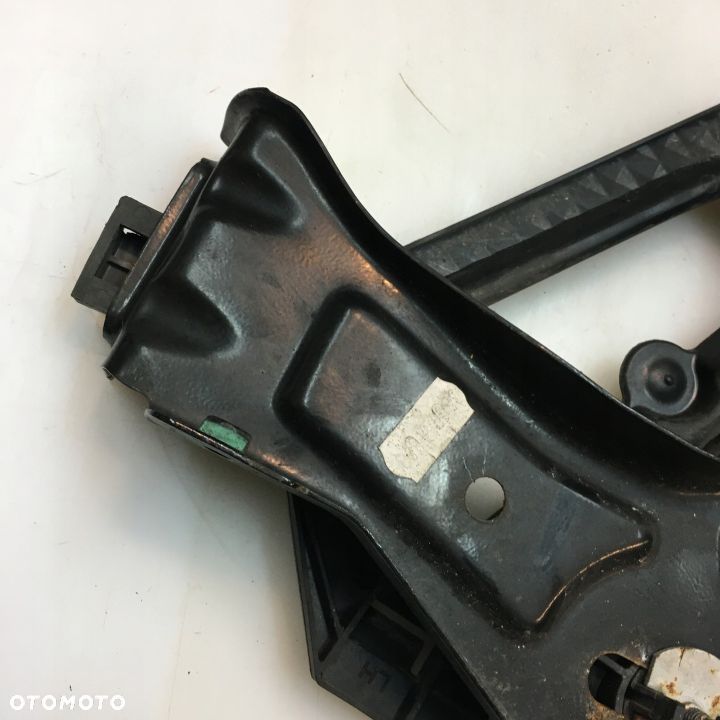 ŚLIZG LAMPY LEWY PRZÓD SKODA OCTAVIA II 1Z0941339 - 4