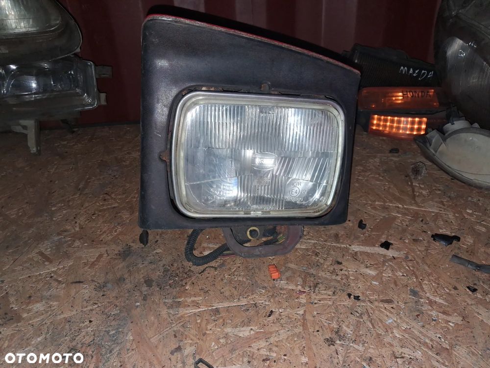 Reflektor LAMPA PRZÓD LEWY LEWA MAZDA 323F - 2