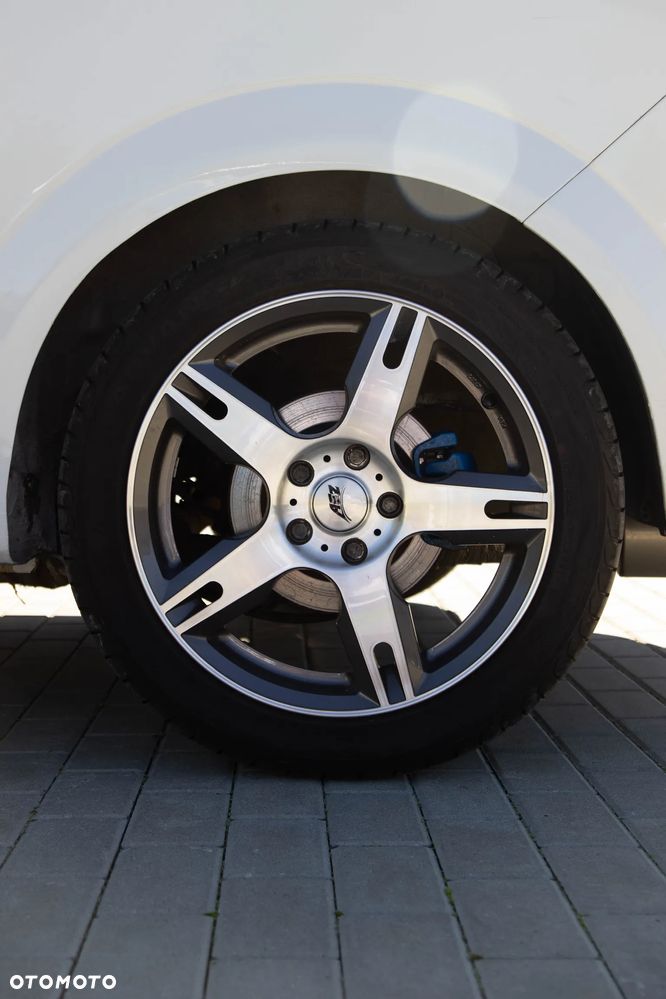 Opel Astra 1.8 Sport - 12
