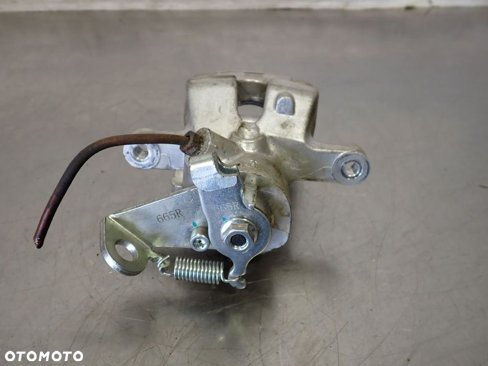 ZACISK HAMULCA PRAWY TYŁ RENAULT MEGANE SCENIC 1.9 - 3