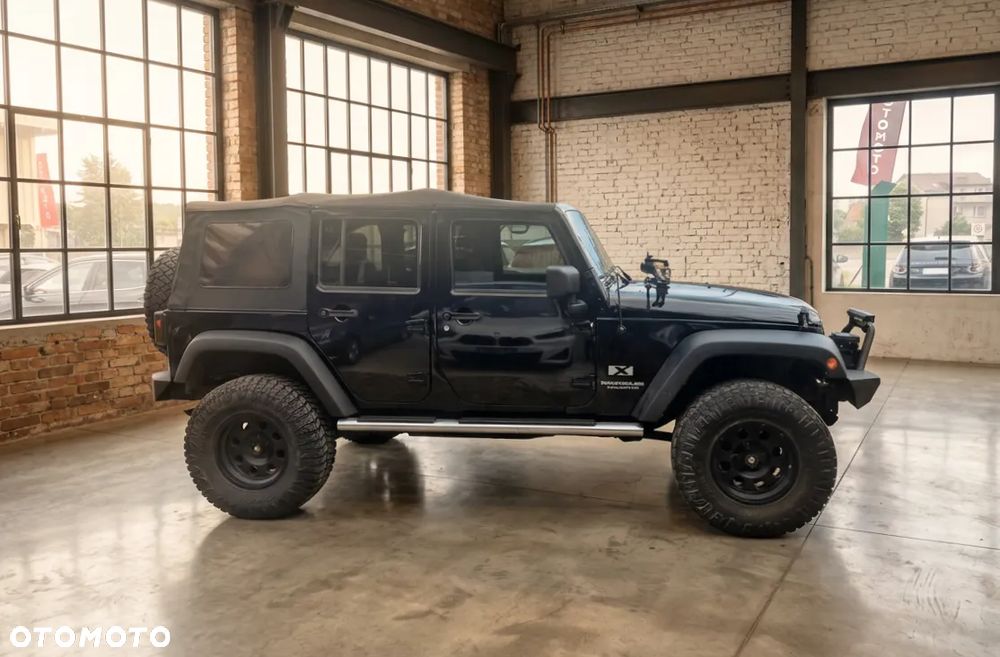 Jeep Wrangler Unlimited 3.8 Sport - 4