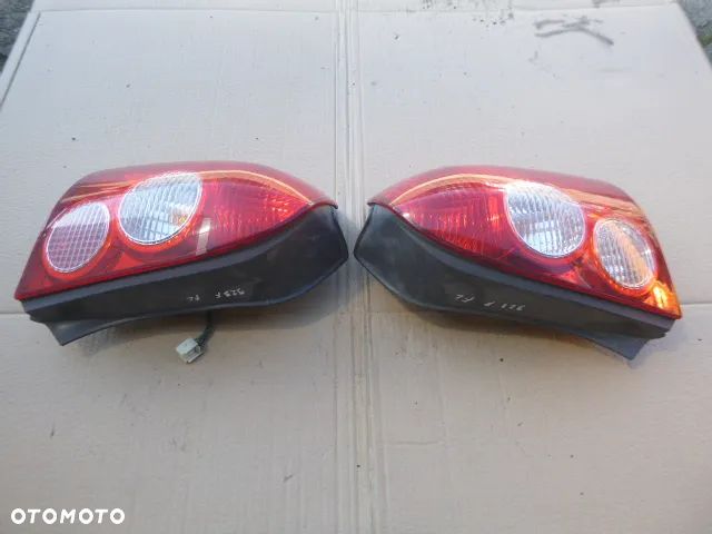 LAMPA LEWY TYŁ PRAWY TYŁ KOMPLET MAZDA 323F LIFT 01-03 - 12