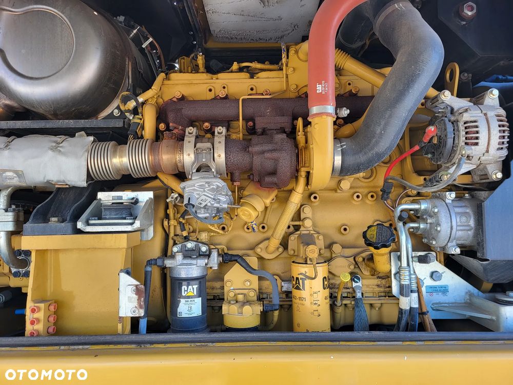 Caterpillar M 318F / z Niemiec /  9300 mth / - 9