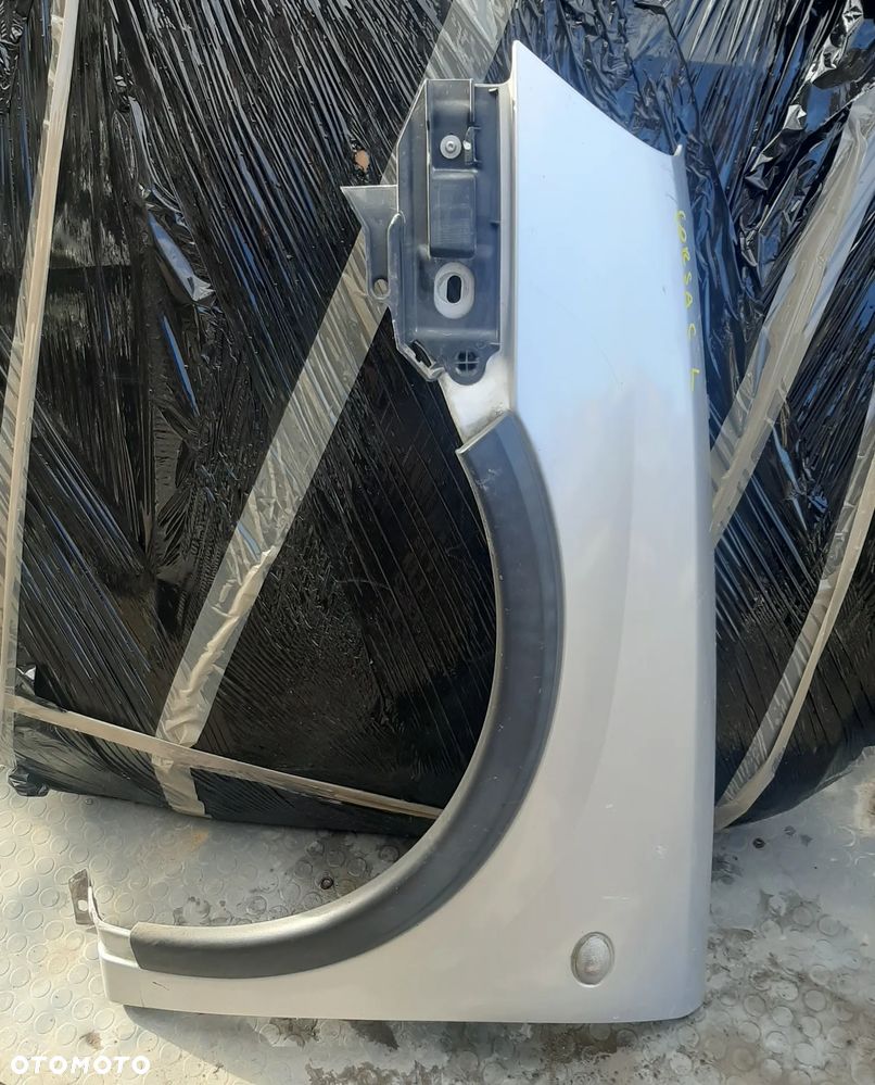 Błotnik OPEL CORSA C prawy lewy OE - 1