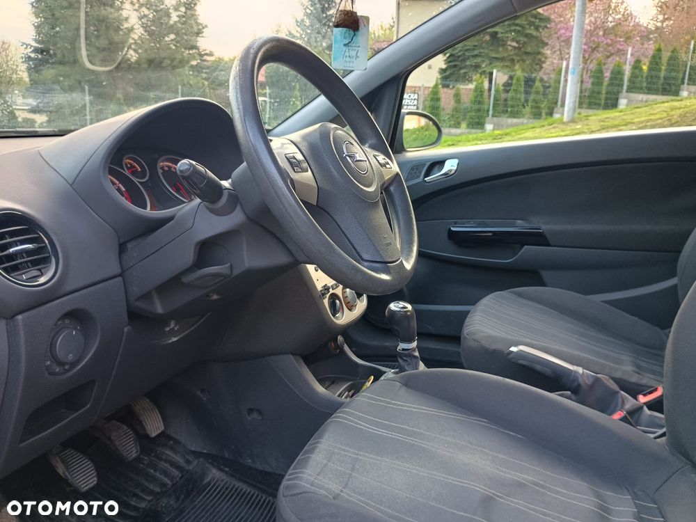 Opel Corsa 1.2 16V Enjoy - 11
