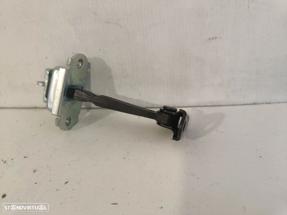 Limitador dobradiça esticador porta frente Toyota Yaris 1999 a 2004 (novo) - 2