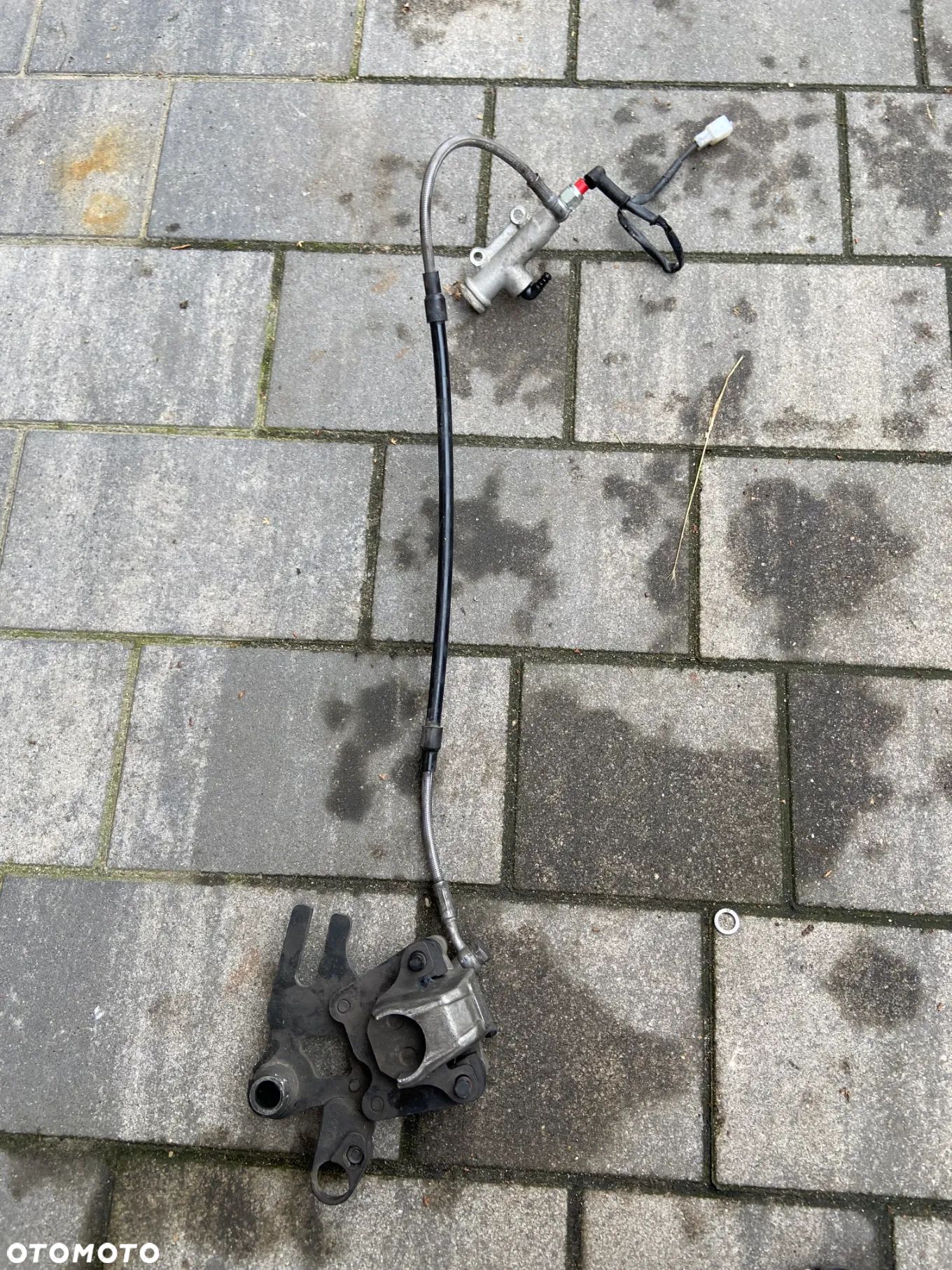 Uklad hamulcowy tył pompa zacisk Rieju MRT - 1