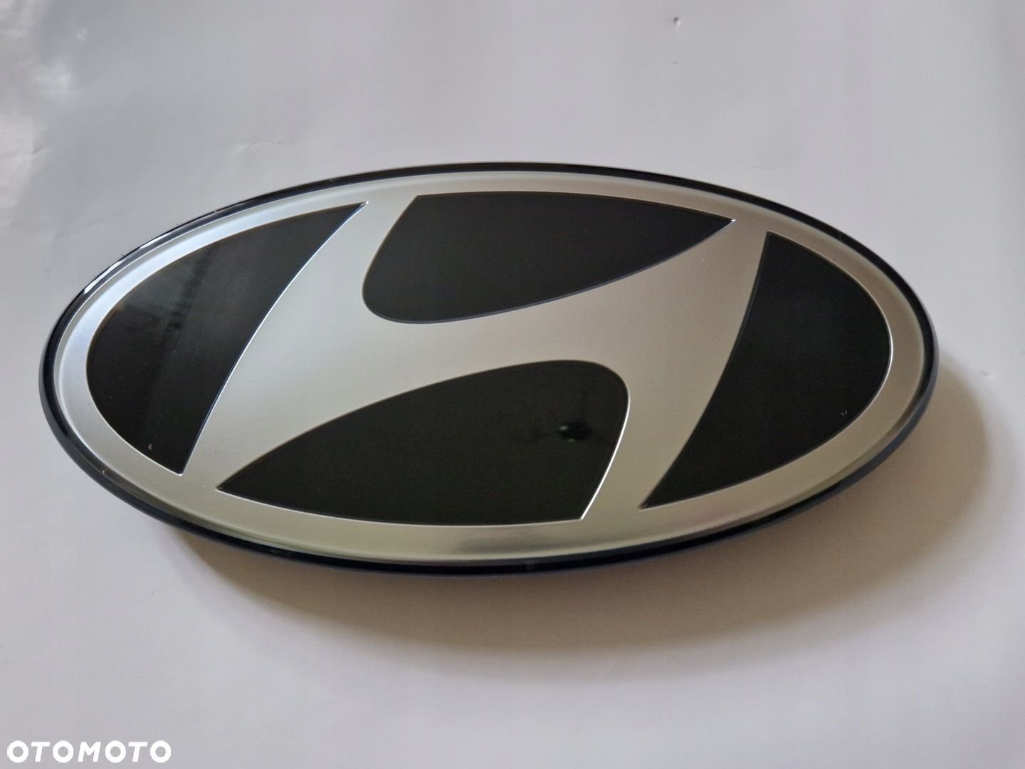 Hyundai i30 III Emblemat Znaczek Logo pod RADAR ACC 86367G4900 NOWY OE - 1