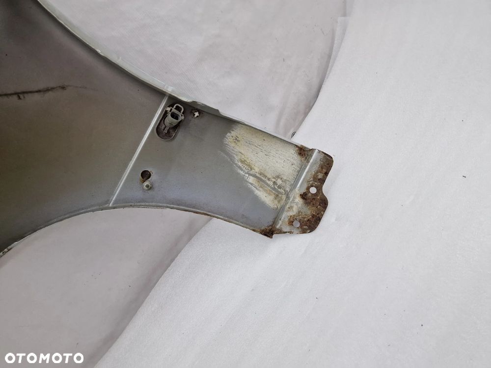 OPEL OMEGA C 99-02 SREBRNY PRAWY BŁOTNIK PRZEDNI PRZÓD , NR AUKCJI BŁ179 - 16