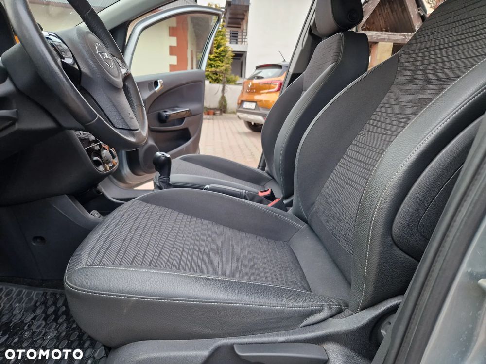 Opel Corsa 1.2 16V Enjoy - 23