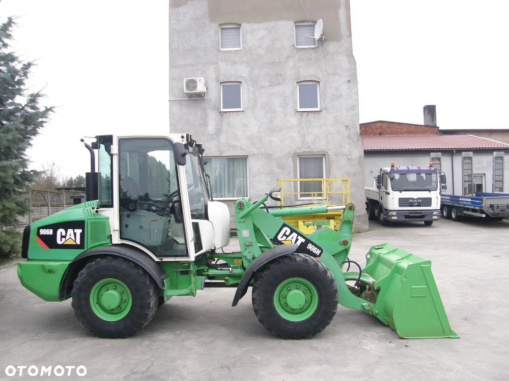 Caterpillar 906H 2009 łyżka widły ładowarka z Niemiec - 2