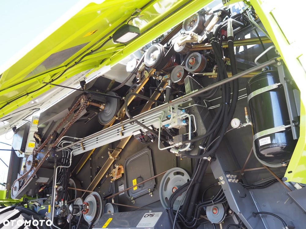 Claas Tucano 570 + V680 - 9