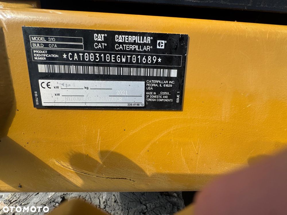 Caterpillar 310 - 32