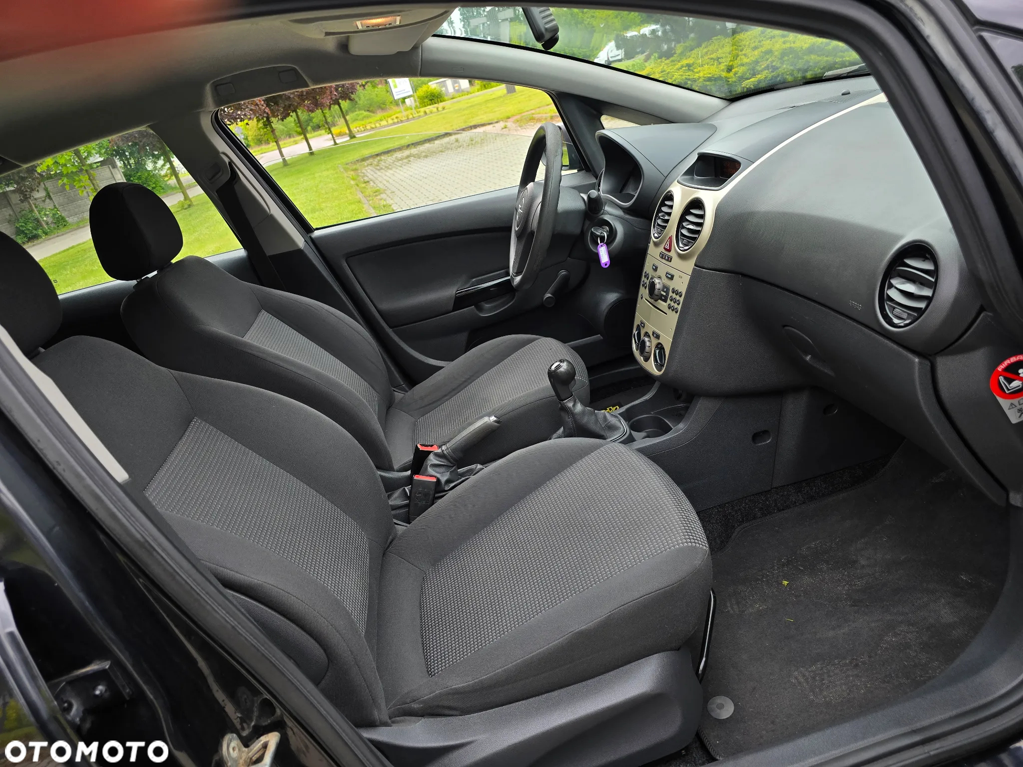 Opel Corsa 1.2 16V Enjoy - 23