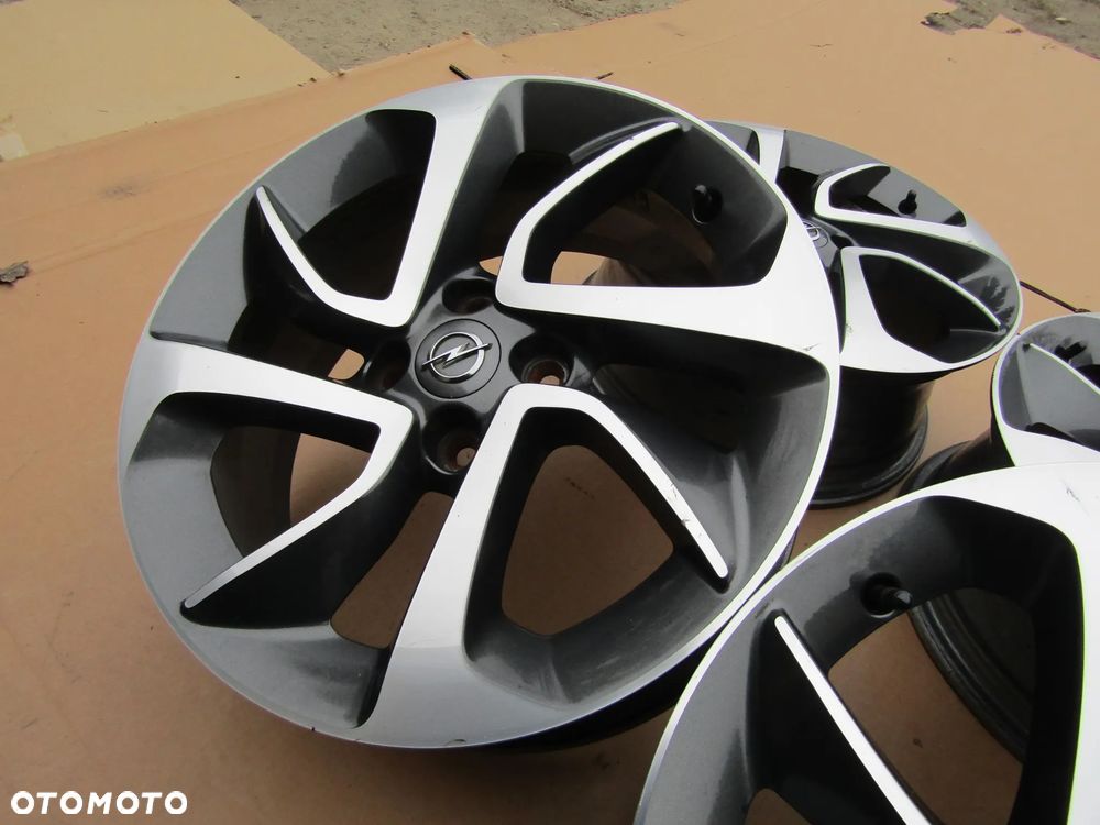 4x Felgi 16 Opel Adam Astra G H Corsa D E Meriva Combo C Karl Fiat Grande Punto Evo 4x100 - 13