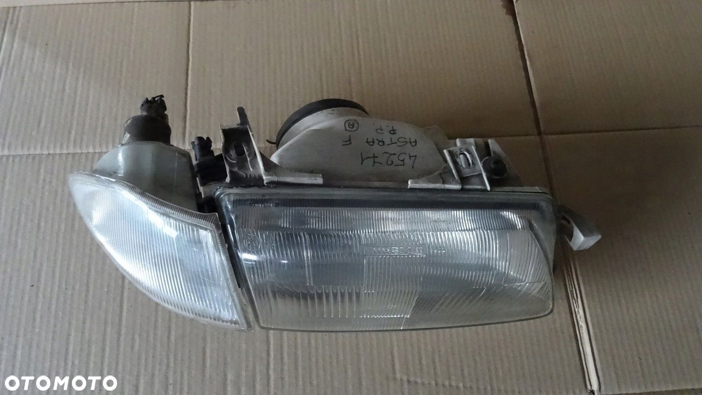 ASTRA 1 I F REFLEKTOR PRAWY PRZÓD 90383783 - 2