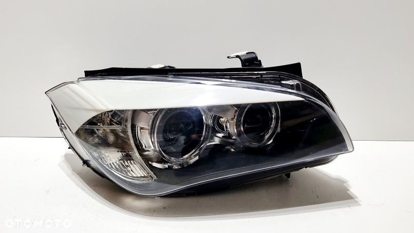 REFLEKTOR PRAWY XENON BMW X1 E84 EUROPA - 2