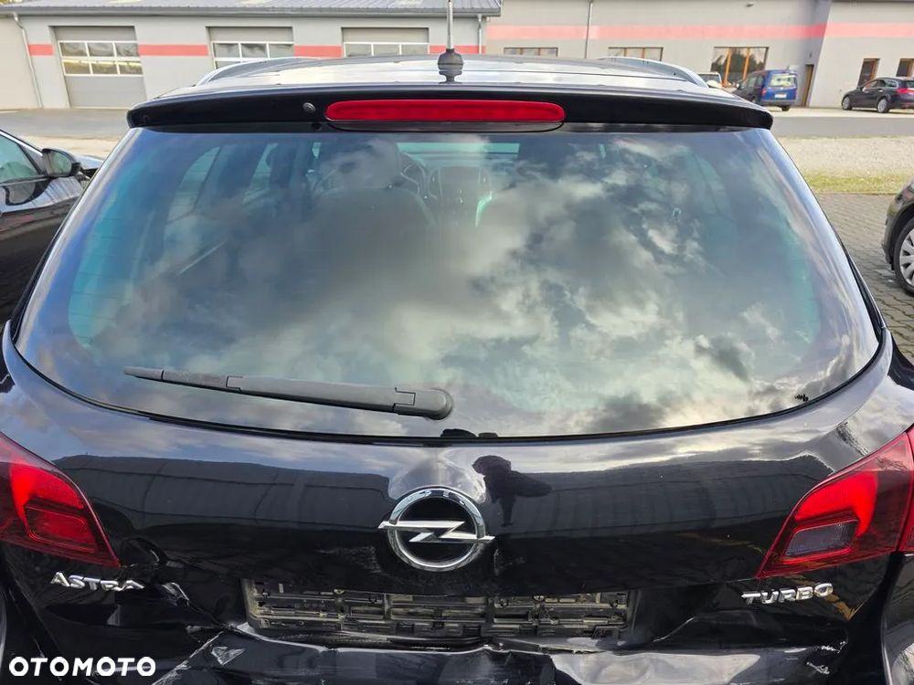 OPEL ASTRA J IV 4 KOMBI SZYBA TYLNEJ KLAPY PRZYCIEMNIANA DYMIONA - 1