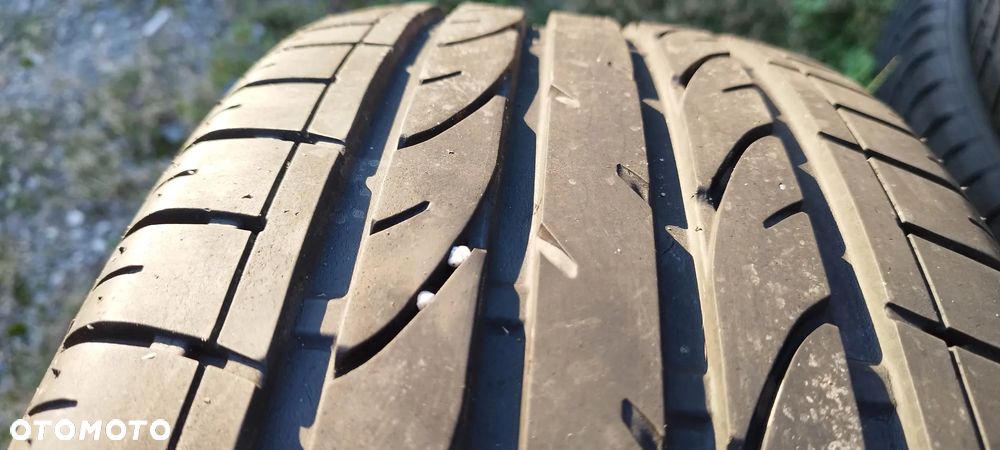 235/50/18 bridgestone dueler h/t sport - 1