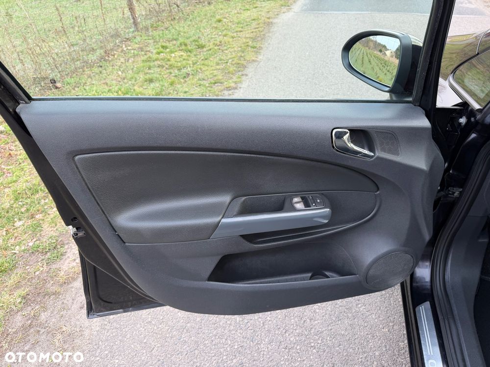 Opel Corsa 1.4 16V Active - 26