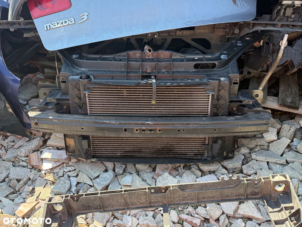 Mazda 2 DY 2003/2006r maska pokrywa silnika 27K  grill wygłuszenie maski belka chlapacze lampy wzmocnienie zderzak tył blotnik kmaska pokrywa silnika drzwi lampy tył  przed lift lub polift czy sport zaslepka Moduł przetwornica Xenon starter cewka ksenon zaslepka - 5