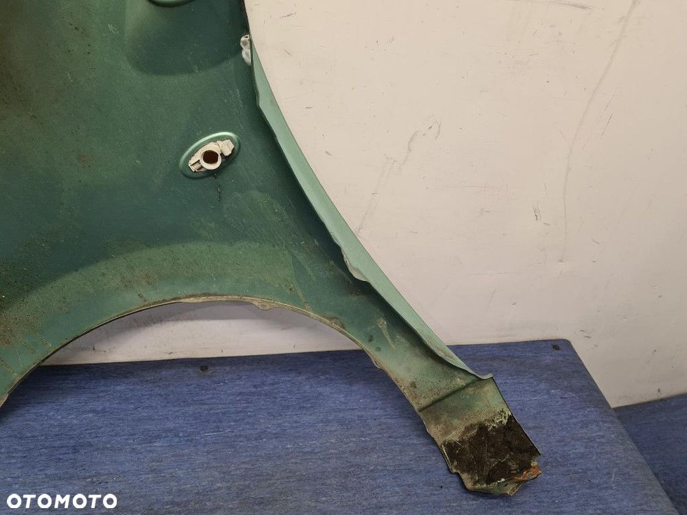 SUZUKI ALTO VII BŁOTNIK PRZÓD PRAWY  ZKZ - 9