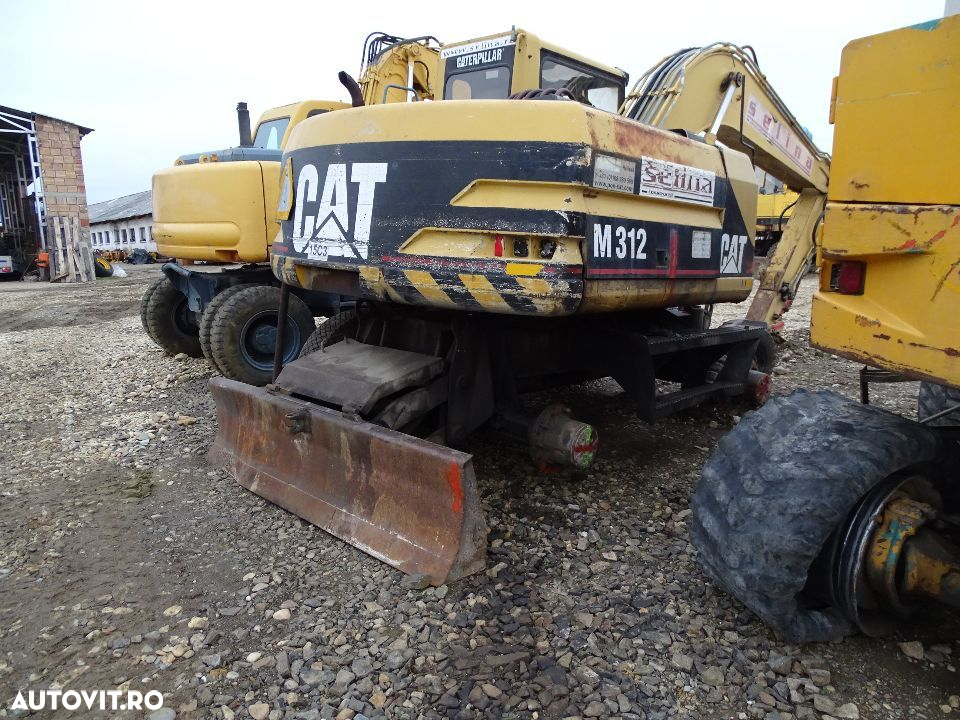 Excavator CAT 312 M,piese - 2