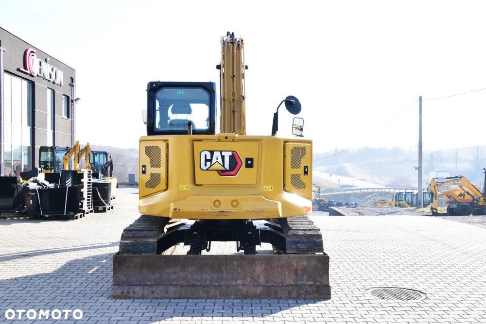 Caterpillar 310 - 11