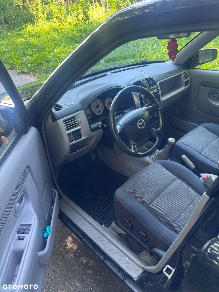 Mazda Demio - 9