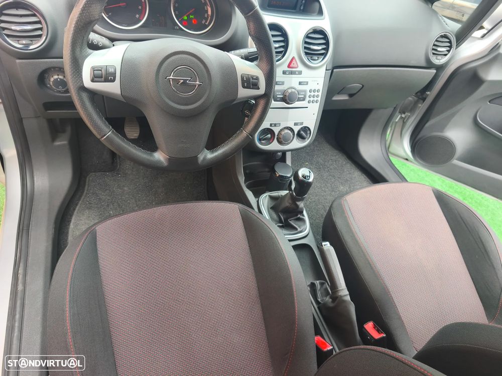 Opel Corsa 1.2 - 13