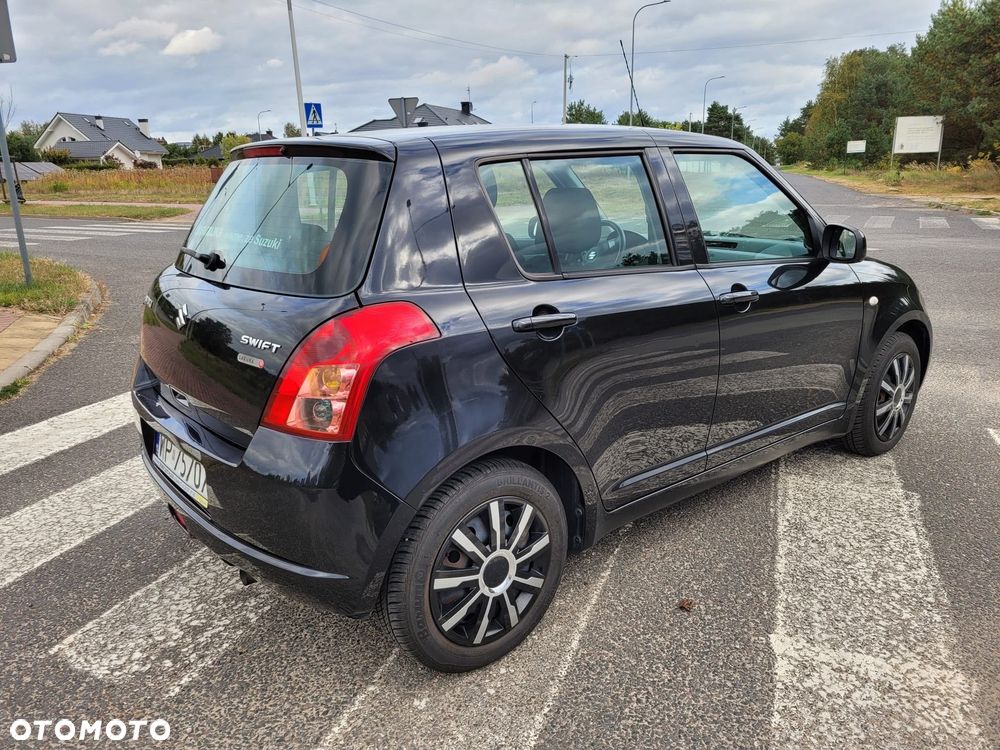 Suzuki Swift 2009 photo 2