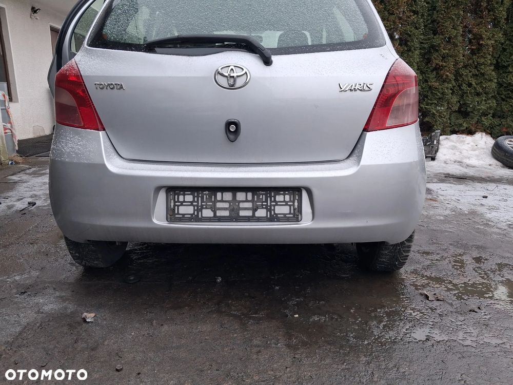 TOYOTA YARIS II 1E7 ZDRRZAK TYLNY - 1