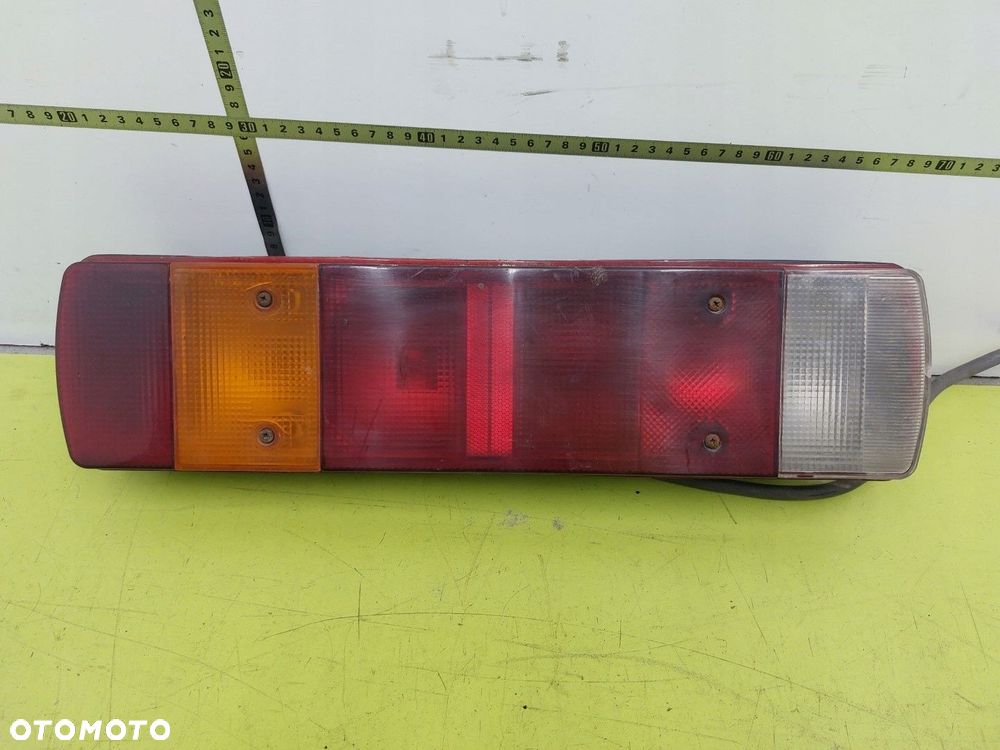 Lampa lewa tylna tył Scania R114 1995-2004 - 1