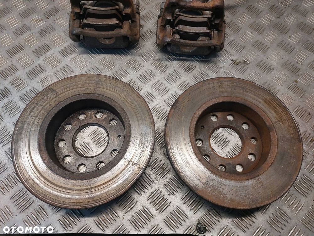 TARCZE HAMULCOWE TYŁ + KLOCKI + ZACISKI  VOLKSWAGEN TOURAN I 254MM - 6